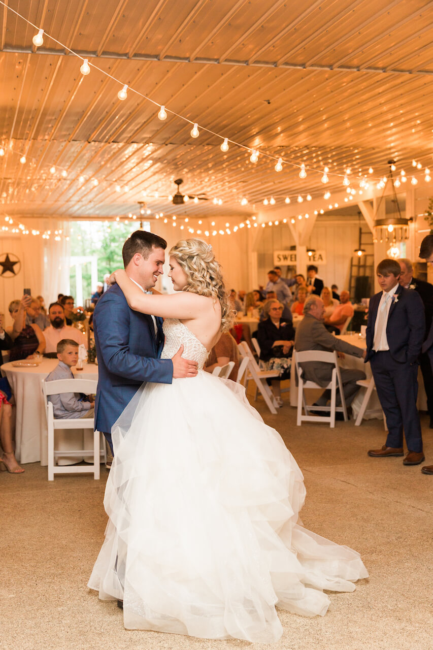 Modern barn wedding reception details with clean, contemporary decor