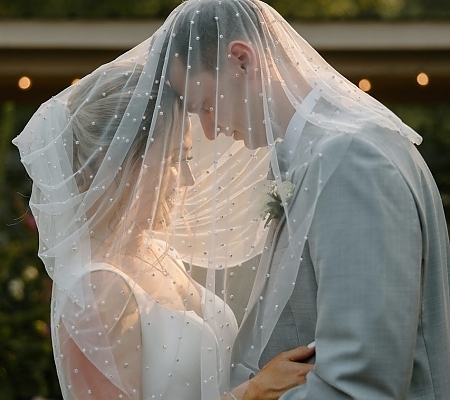 Veiled Couple Wedding Photo